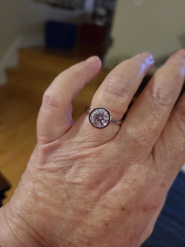 Customer photo review of Solitaire Round Moissanite Bezel Set Engagement Ring