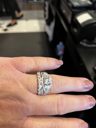 Customer photo review of Halo Three Stone Moissanite Triple Pave Engagement Ring