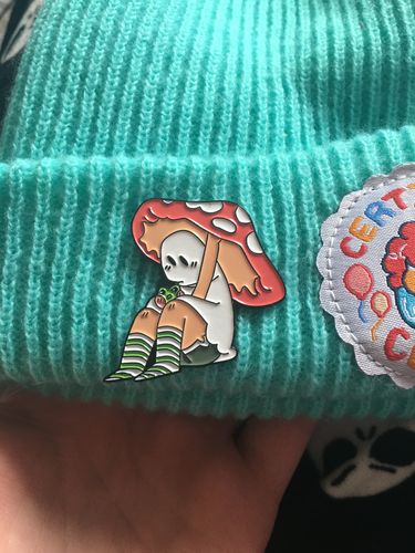 Customer photo review of Red Mushroom Ghost Enamel Pin