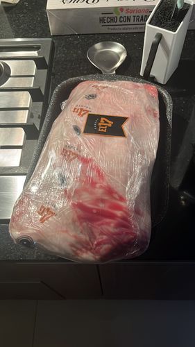 Reseña con foto de un cliente sobre New York Pieza Básica