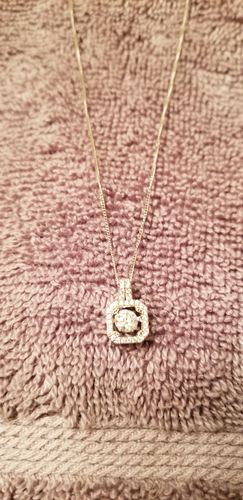 Customer photo review of Dancing Moissanite Square-Shaped Halo Necklace in Sterling Silver