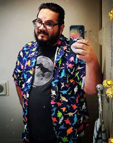Customer photo review of Colorful Dinosaur Silhouettes Navy Button Up Shirt