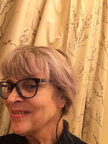 Customer photo review of Molto Kiss Stud Earrings