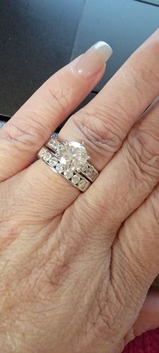 Customer photo review of Channel Set Moissanite Half Eternity Wedding Band Ring In Sterling Silver