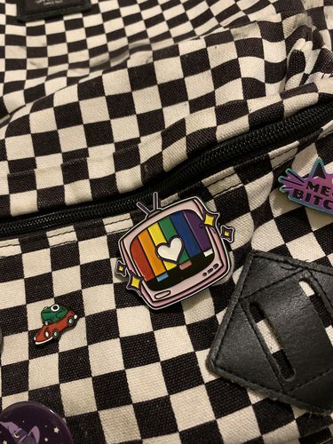 Customer photo review of Rainbow TV Enamel Pin 1.5in