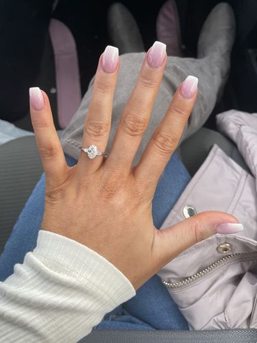 Customer photo review of 1.30 Carats Lab Grown Oval Cut with Pear Shape Side Stones Diamond Engagement Ring in White Gold