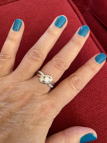 Customer photo review of Swirl Three Stone Moissanite Twisted Pave Engagement Ring
