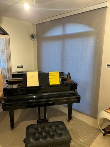 Customer photo review of SmartWings Motorized Light Filtering Roller Shades 70% Blackout Safari