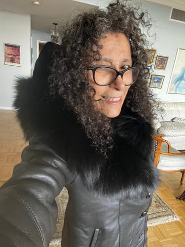 Customer photo review of Burnett Brown Shearling coat with large fox fur hoodie and trim