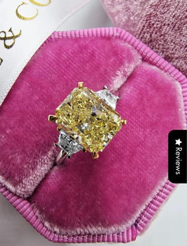 Customer photo review of 2.67 Carats Fancy Yellow Radiant Cut Trapezoid Side Stones Diamond Engagement Ring