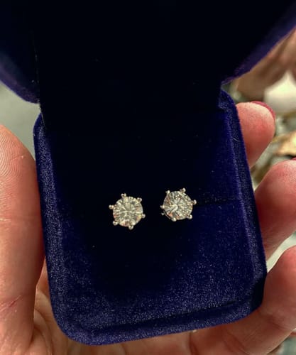 Customer photo review of Luxuria Moissanite 14K White Gold Plated Silver Stud Earrings