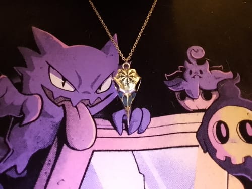 Customer photo review of Helm of Awe Raven Pendant