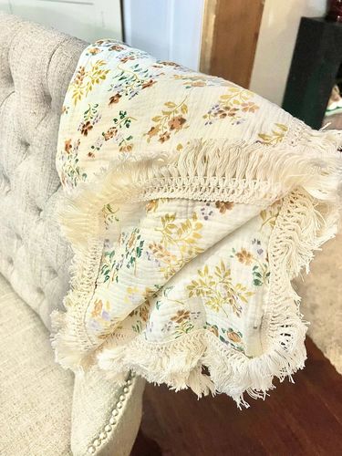 Customer photo review of Floral Tassel Swaddle Blanket