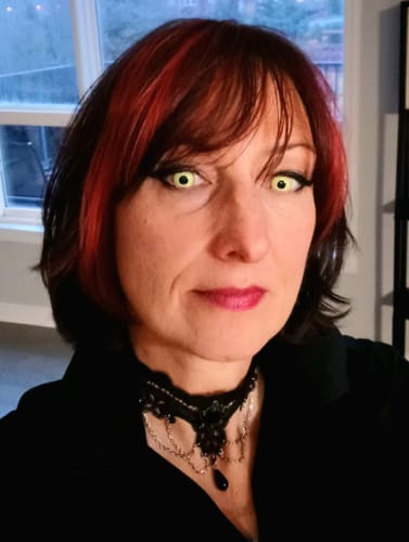 Customer photo review of PRIMAL ® Nightcrawler - Neon Yellow with Orange Rim Color Contact lenses