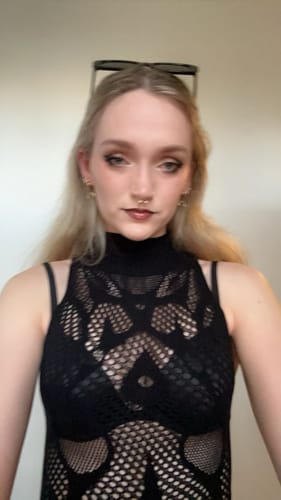 Customer photo review of Fishnet sleeveless hollow out high neck see through mini dress goth Alternative Darkwave Fashion