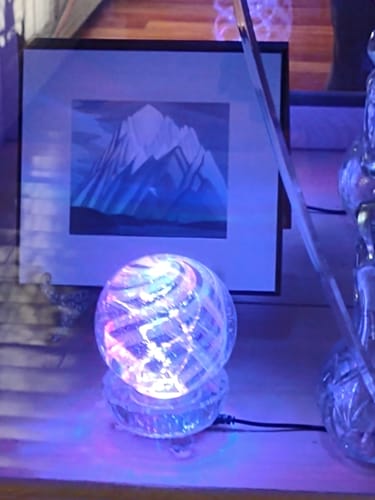 Customer photo review of Illuminated Dichroic Rainbow Orb with Cremains