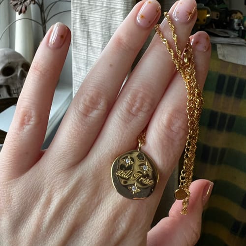 Customer photo review of Still I Rise Necklace