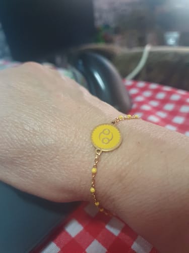 Customer photo review of PULSERA ZODIACO AJUSTABLE ACERO INOXIDABLE BAÑADO EN ORO 18K "CANCER"