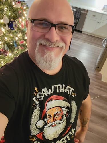Customer photo review of Premium Santa I Saw That Ya Nasty Christmas Party Tee