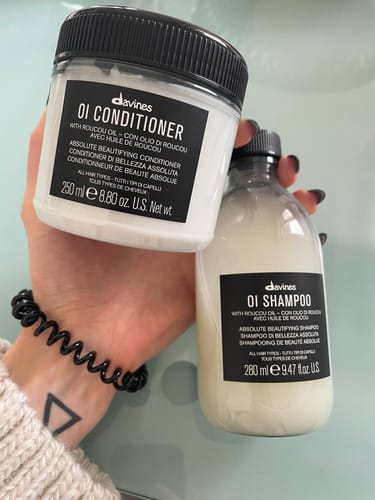Customer photo review of OI Shampoo + Conditioner