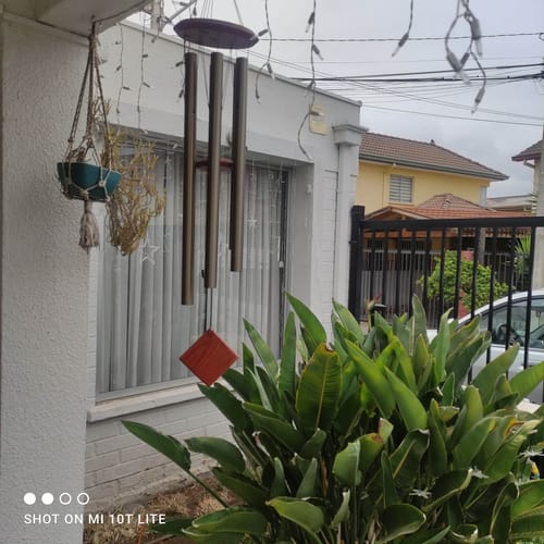Customer photo review of CAMPANA DE VIENTO DEL PARAÍSO BRONCE 32"