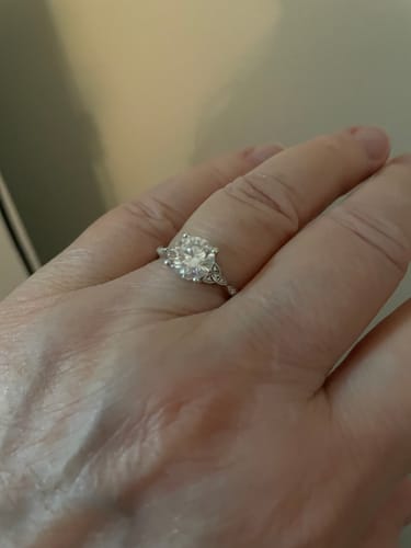 Customer photo review of Celtic Love Knot Moissanite Accents Engagement Ring