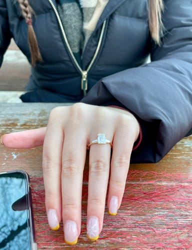 Customer photo review of Clutch Three Stone | Emerald