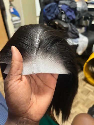 Customer photo review of Glueless Preplucked Human Hair Wigs Ready To Wear And Go Brazilian Bone Straight 13x4 HD Lace Frontal Human Hair Wig For Women