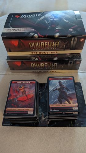 Customer photo review of PREORDER: Set Booster Box - Phyrexia All Will Be One (Magic: The Gathering)