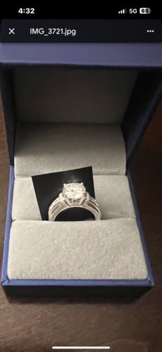 Customer photo review of Moissanite With Channel Set Sapphire Accents Engagement Ring
