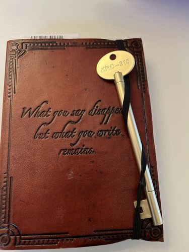 Customer photo review of What You Write Remains Quote Leather Journal - 7x5