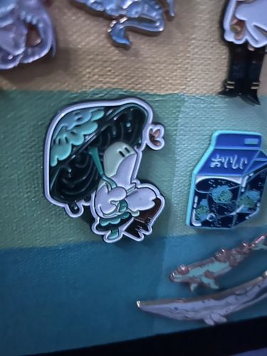 Customer photo review of Blue Mushroom Ghost Enamel Pin 2in