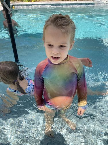 Customer photo review of Cheeky Cloth Rainbow Rashguard (Limited Pre-order)