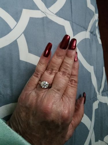 Customer photo review of Solitaire Moissanite Half Bezel Set Sterling Silver Engagement Ring