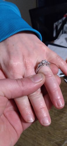 Customer photo review of Vintage Three Stone Moissanite Scrollwork Engagement Ring