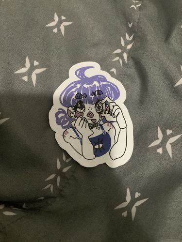 Customer photo review of Split Eye Girl Sticker!