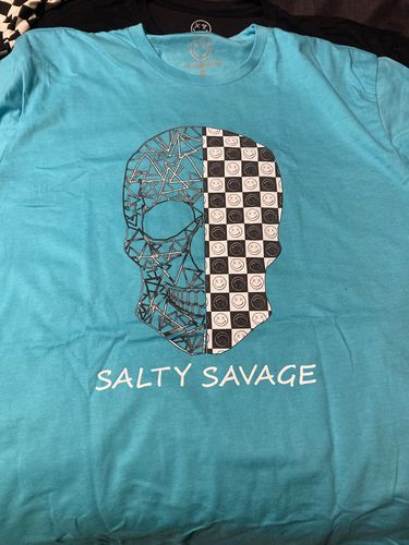 Customer photo review of Salty Savage Unisex “Spliced Geo Checkered Skull” Tee | Island Teal/Black
