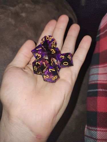 Customer photo review of Dark Purple Black Smoky Glitter Resin DnD Dice Set Moon Dice