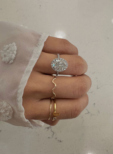 Customer photo review of 2 Carats Lab Grown Oval Cut Micropave Halo Side Stones Diamond Engagement Ring