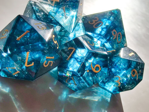 Customer photo review of Dark Blue Lightning Glass Moon DnD D&D Dice Set