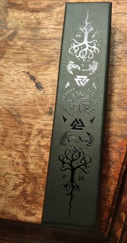 Customer photo review of Green Tinsel Black Resin DnD D&D Dice Set