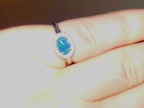 Customer photo review of Opal & Cubic Zirconia Oval Halo Ring in Sterling Silver
