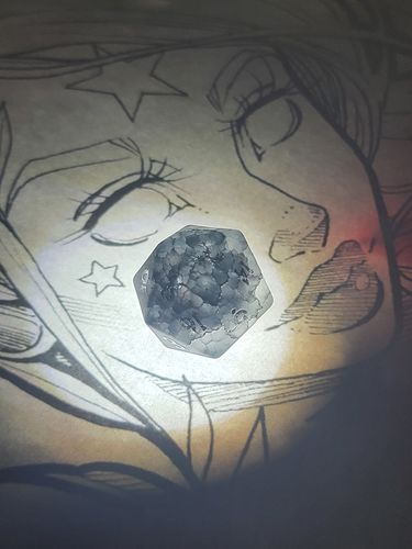 Customer photo review of Raised Black Lightning Glass Phoenix DnD D&D Dice Set