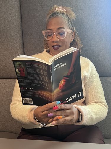 Customer photo review of Autographed Copy -“LOVE SAW IT”- by LAETANIA RICHARDSON
