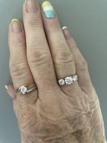 Customer photo review of Classic Three Stone Round Cut Moissanite Sterling Silver Wedding Ring