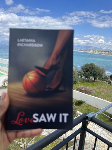 Customer photo review of Autographed Copy -“LOVE SAW IT”- by LAETANIA RICHARDSON