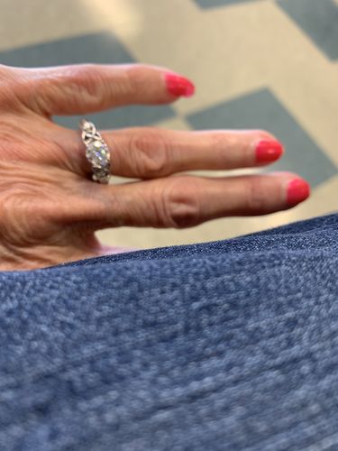 Customer photo review of Vintage Three Stone Moissanite Scrollwork Engagement Ring