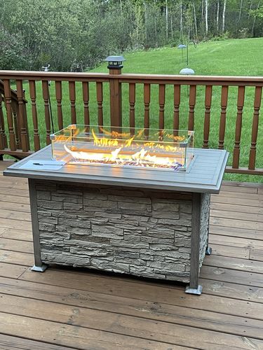 Customer photo review of 44'' Propane Gas Fire Pit Table 50000 BTU Auto-Ignition w/ Wind guard, Aluminum Tabletop,Waterproof Cover, Glass Beads, Brown Faux Stone Surface