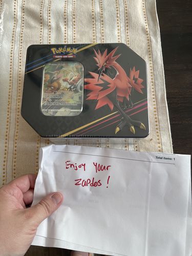 Customer photo review of Pokemon Trading Card Game: Crown Zenith Tin (Assortment)