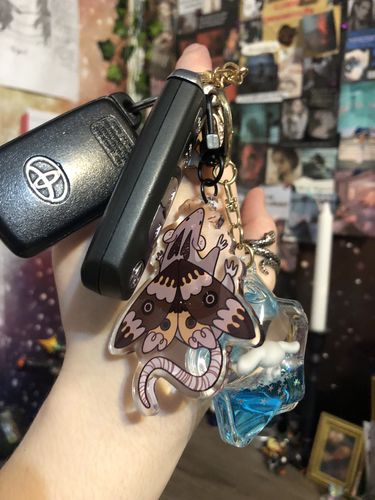 Customer photo review of Moth Rat Keychain